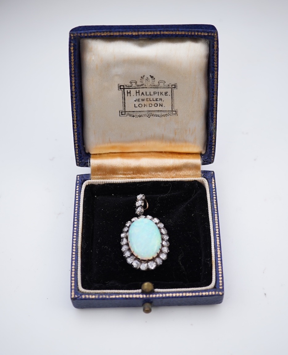 An opal and diamond pendant, early 20th century